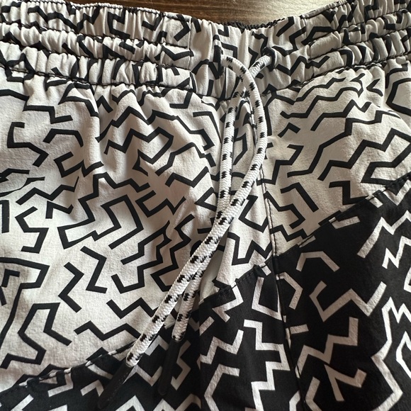 Chubbies Black and White Patterned Athletic Shorts with Red Accents - Picture 4 of 5